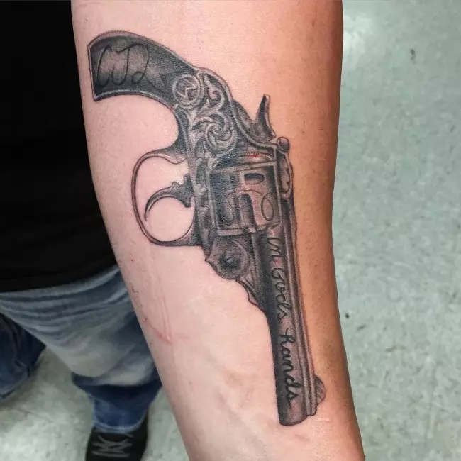 Prison gun tattoos